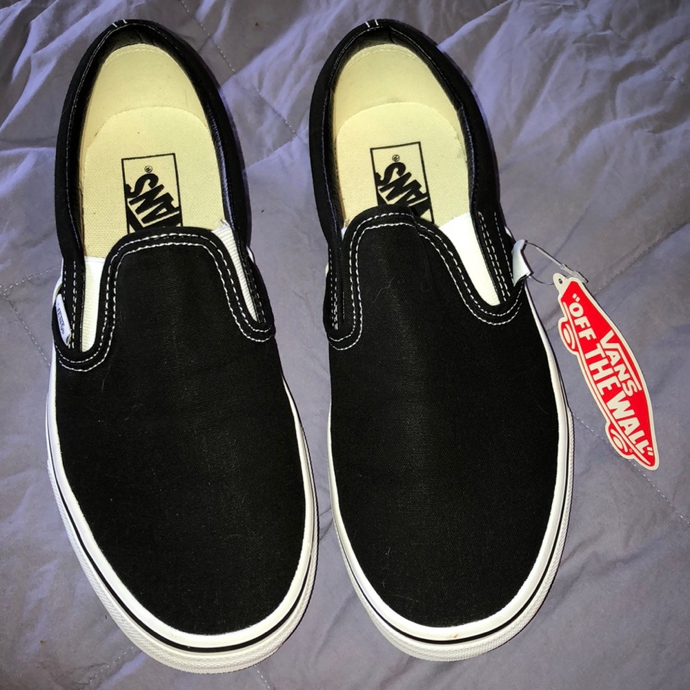 black & white slip on vans